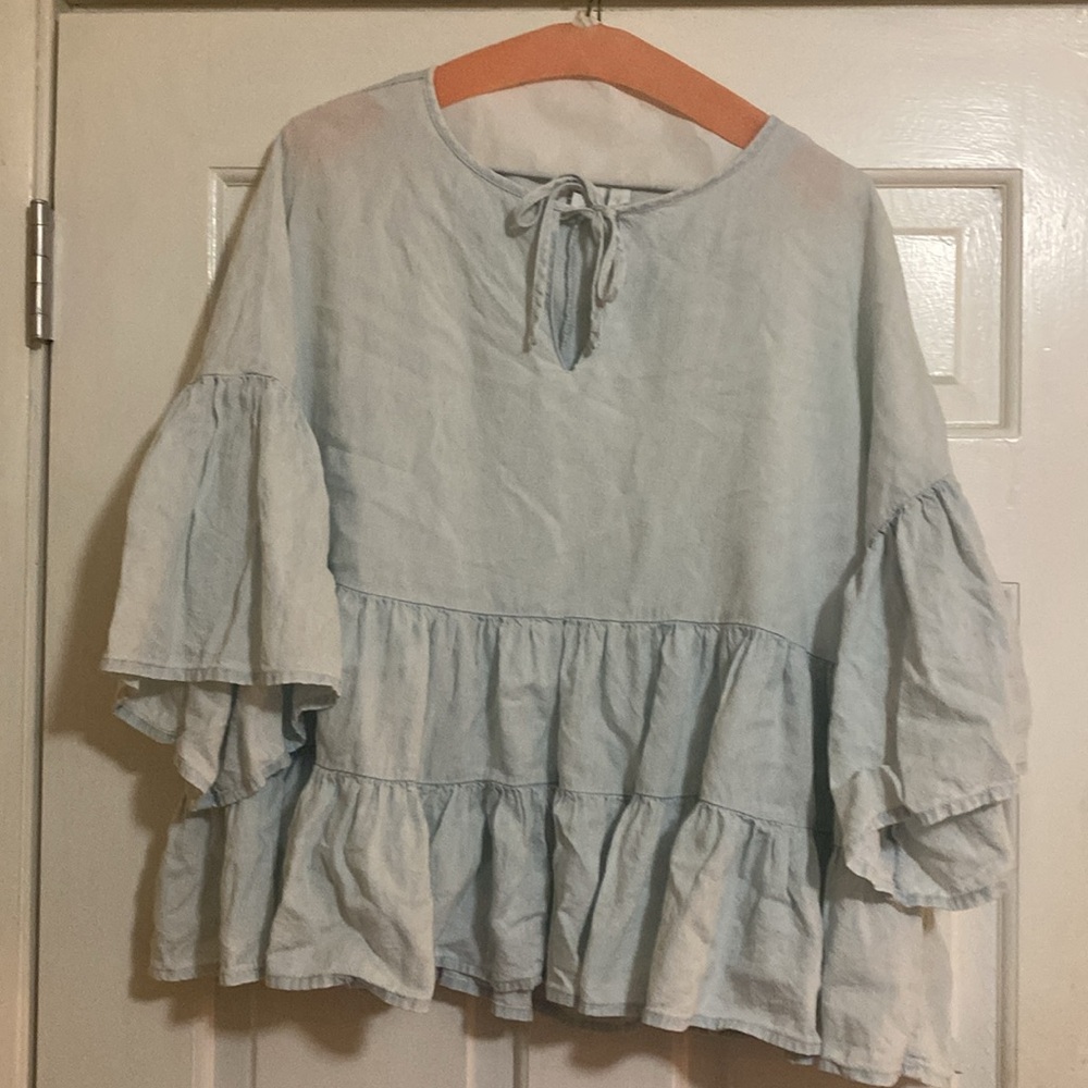 Light blue top